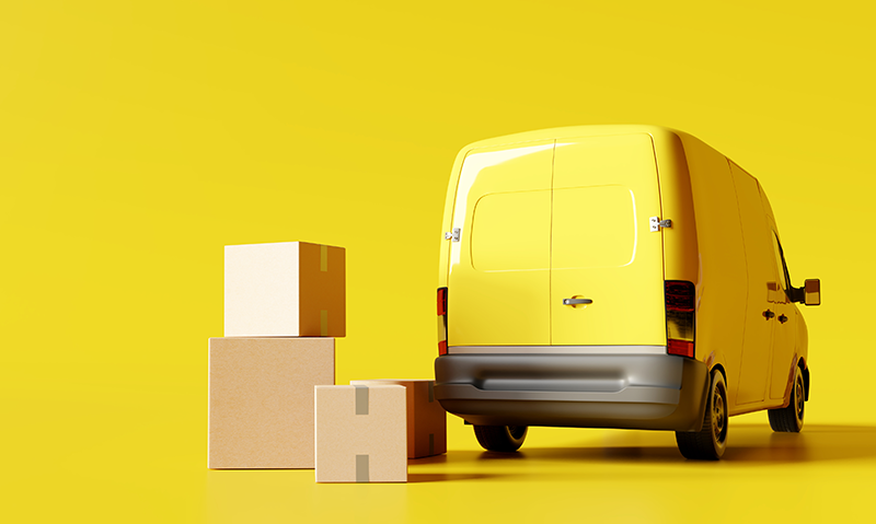 Mehrere Pakete vor einem Transporter.